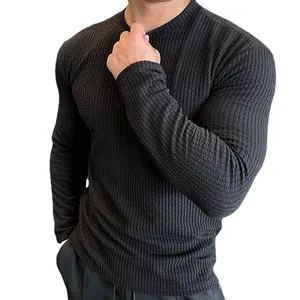 Elegant men's slim fit black textured knit sweater with long sleeves for autumn