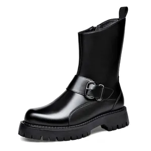 Men's black leather Chelsea boots with chunky lug sole and buckle strap detail