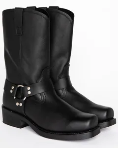 Side view detail of black leather harness boots featuring a square toe and metal ring