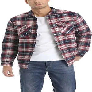 Detailed shot of a men's thick red plaid flannel shirt jacket with flap pockets and buttons
