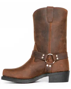 Side profile view of a brown leather harness boot with silver-tone ring and studs.