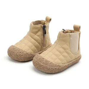 Beige quilted toddler snow boots with side zipper and non-slip textured rubber sole