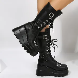 Chic punk style black platform mid-calf boots with buckle straps and thick wedge soles