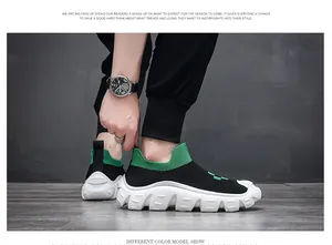 Side view of breathable fly-knit sock shoes for men with thick white sole