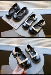Vintage girls' black and white bicolor Mary Jane leather shoes with adjustable buckles