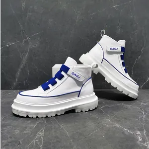 Detailed side view of stylish men's high-top white sneakers featuring blue buckle straps