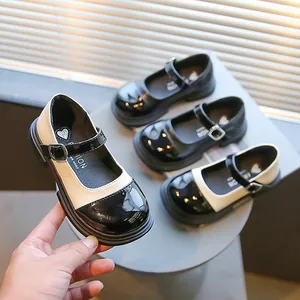 Classic girls' Mary Jane shoes with retro color-block design and glossy patent finish