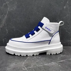 Detailed side view of stylish white men's high-top sneakers with blue strap and chunky sole