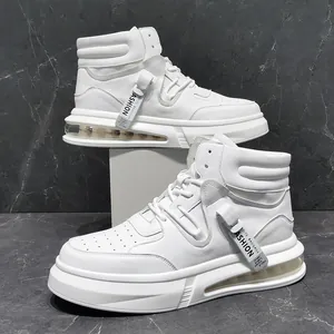 Detailed view of white high-top sneakers with fashion tag and air cushion sole