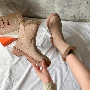 Chic beige suede ankle boots with warm faux fur lining and stylish platform sole
