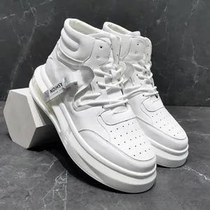 Modern all-white mid-top men's casual sneakers displayed on a grey marble background.