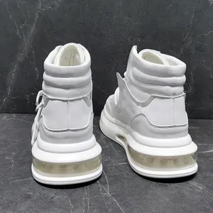 Rear view of white high-top sneakers featuring a chunky transparent air cushion sole.