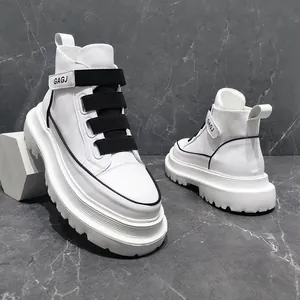 Stylish white high-top Martin boots for men featuring black decorative straps and thick soles