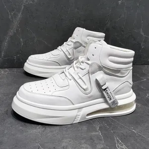 Side profile of stylish white mid-top men's sneakers with chunky sole and detail tag