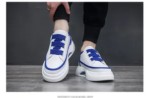 Trendy men's chunky sneakers in white and blue featuring triple hook-and-loop straps.