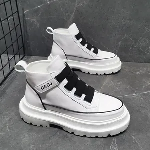 Side view detail of white high-top men's sneakers with black elastic bands and thick soles.