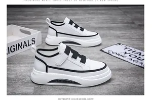 Premium white men's fashion sneakers with black contrast straps and air cushion sole detail