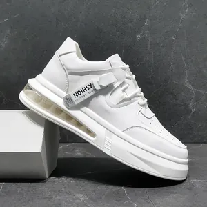 Detailed side view of white mid-top men's casual sneakers featuring a clear air cushion sole