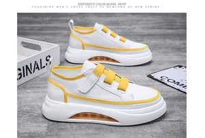 Stylish men's white and yellow chunky sneakers with air cushion sole and Velcro straps