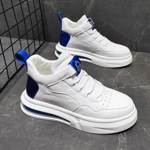 Detailed view of men's high-top white sneakers with blue air cushion and leather finish