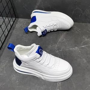 Detailed shot of stylish white men's sneakers with blue air cushion and heel tab