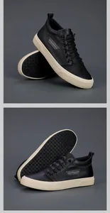 Vista dettagliata di sneakers alte nere da uomo con suola antiscivolo strutturata