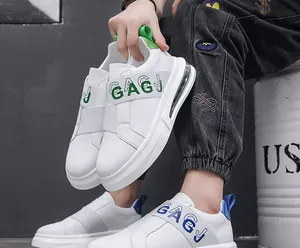 Close-up detail of men's stylish white fashion slip-on sneakers with elastic GAGJ straps