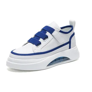 Modern white and blue men's sneakers with a thick sole and visible air cushion unit