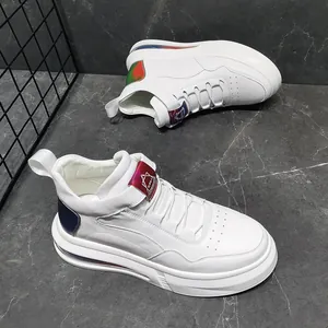 Side view of white men's fashion sneakers with thick air cushion soles and metallic accents