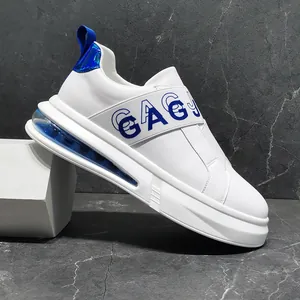 Close-up of white slip-on men's sneaker with blue air cushion and elastic strap