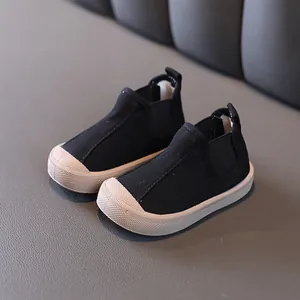 Black boys mid-top canvas shoes with warm lining, anti-slip toddler walking boots.