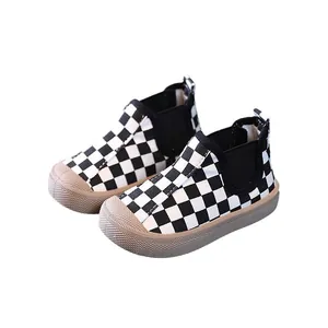 Infant boys' mid-top checkered canvas walking shoes featuring warm lining and rubber soles
