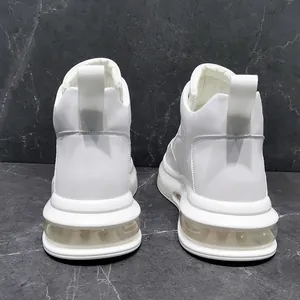 Detailed rear view of white high-top men's sneakers with transparent air cushion soles