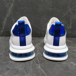 Back view of white men's sneakers with blue metallic heel and air cushion sole