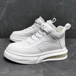 Modern white high-top men's sneakers featuring thick air cushion soles on marble background