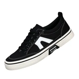 Classic black men's canvas sneakers with white soles shown at a diagonal angle