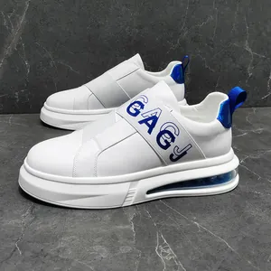 Detail of white slip-on sneakers featuring blue elastic strap and air cushion sole.