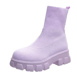 Detailed side view of lavender fly-knit sock boots featuring a chunky platform sole