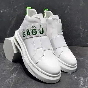 Stylish white high-top men's sneakers with green elastic band detail and thick sole.