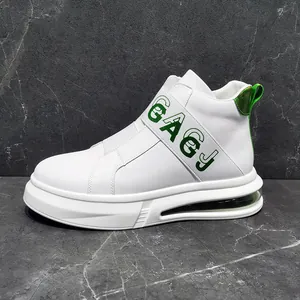 Detailed side view of white high-top men's sneakers featuring a green GAGJ logo strap