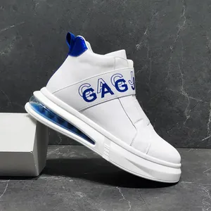 Side detail of white high-top sneakers with blue elastic strap and air cushion sole