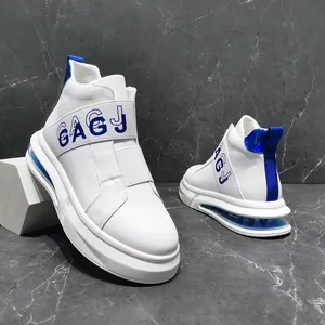 Stylish white men's high-top slip-on sneakers with blue accents and elastic strap detail