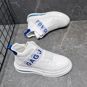 Detail of white high-top sneakers with blue GAGJ elastic strap and air cushion sole.