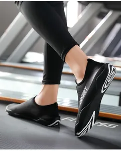 Detailed side view of black breathable yoga fitness shoes with non-slip soft soles