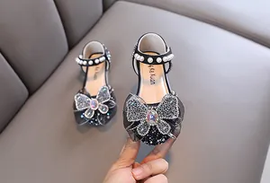 Elegant girls' black princess leather shoes with a sparkling rhinestone butterfly bow