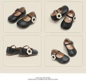 Detailed multi-angle views of black toddler girl's leather shoes with flower detail