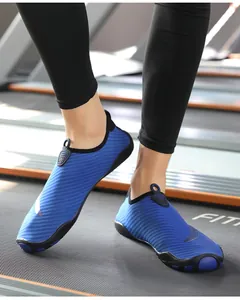 Detailed side view of breathable blue water shoes suitable for yoga, fitness, and beach activities