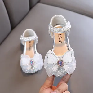 Elegant silver girls princess shoes featuring pearl straps and a sparkly lace bow