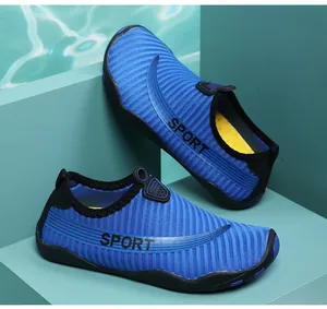 Detailed macro view of blue striped breathable aqua shoes for swimming and beach yoga