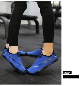 Detailed shot of blue breathable aqua shoes for couple yoga and outdoor beach activities